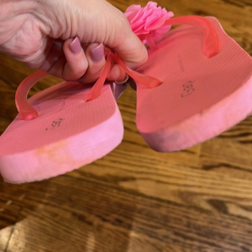 Gap kids pink flip flops with rose detail size 3.